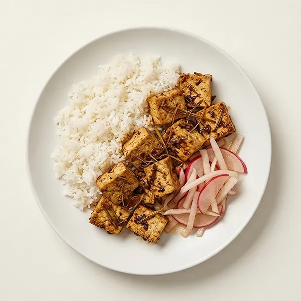 Vietnamese lemongrass tofu rice bowl with pickled Raddish
